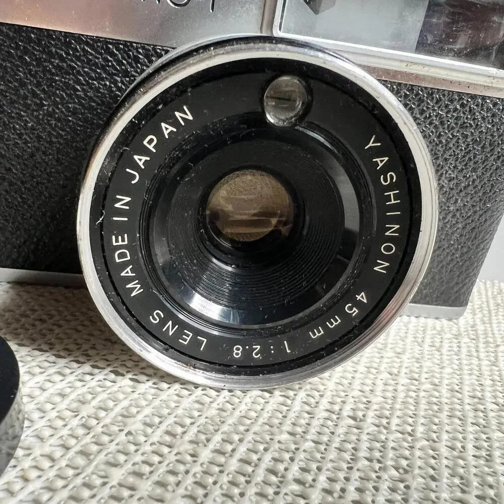Yashica MG-1 35mm Rangefinder Film Camera 45mm f/2.8 Lens Made in‎ Hong Kong Cap